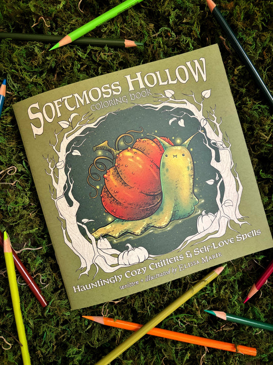 Coloring book front cover titled 'Softmoss Hollow' on a mossy background with colored pencils.